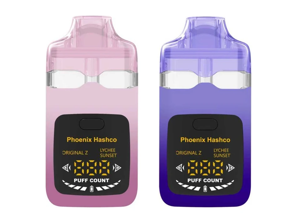 Two Phoenix Hashco devices in pink and purple carrying a gold phoenix illustration