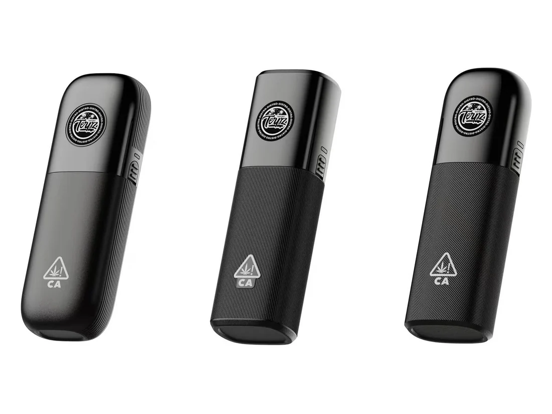 Three Teuzz Distro devices in black showing gloss, fine-ribbed and cross-hatch surface finishes